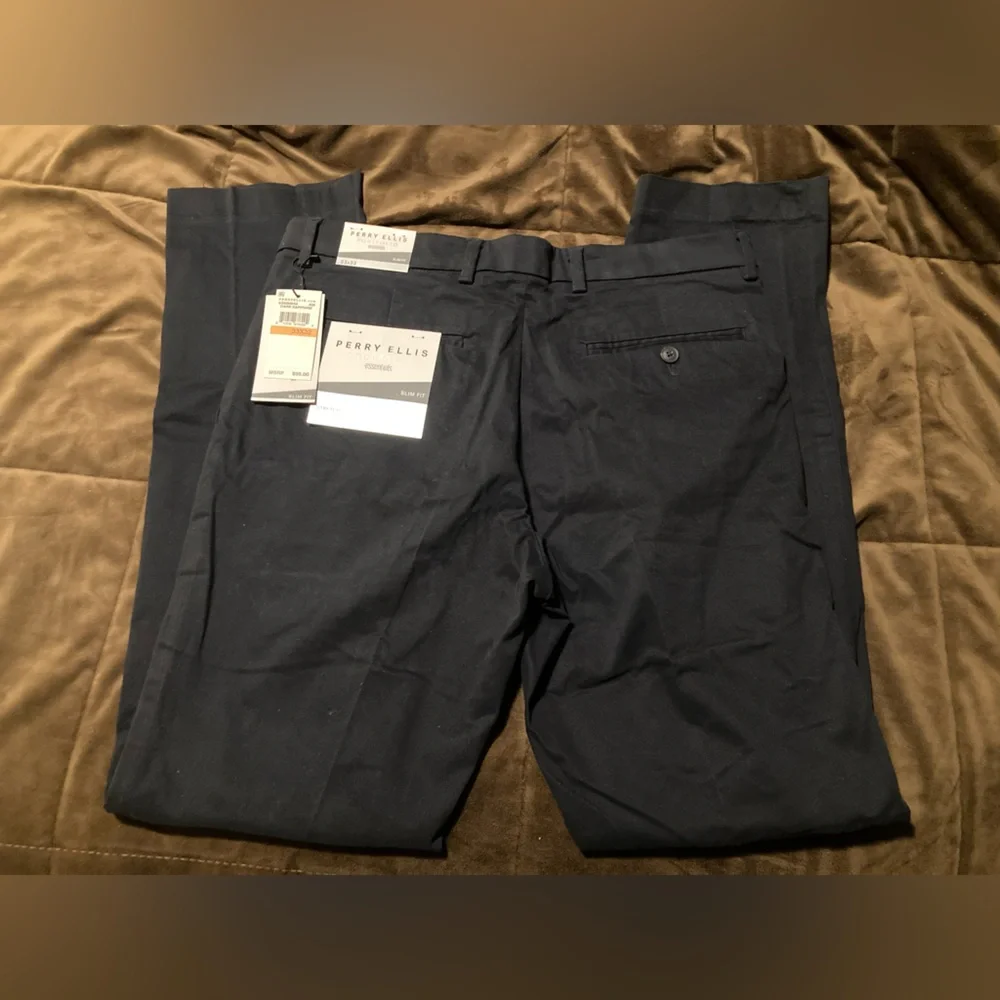 Perry Ellis brand, size 33 x 32, new with tags, dark sapphire color, men’s pants
